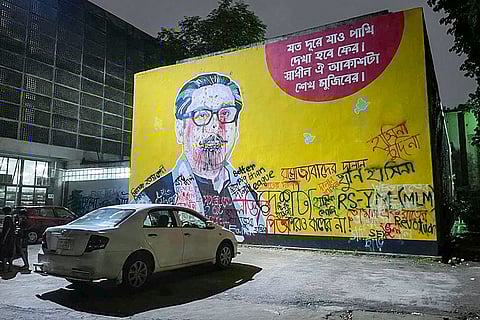 Mujibur Rahman’s murals stand defaced in Dhaka